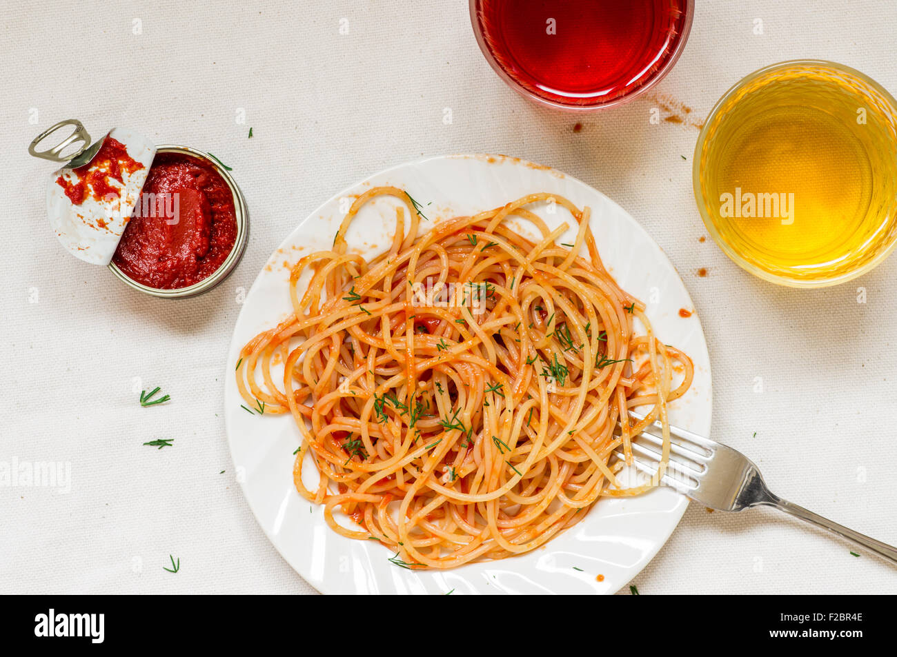 Plate of spaghetti Napoli with red and white wine Stock Photo Alamy