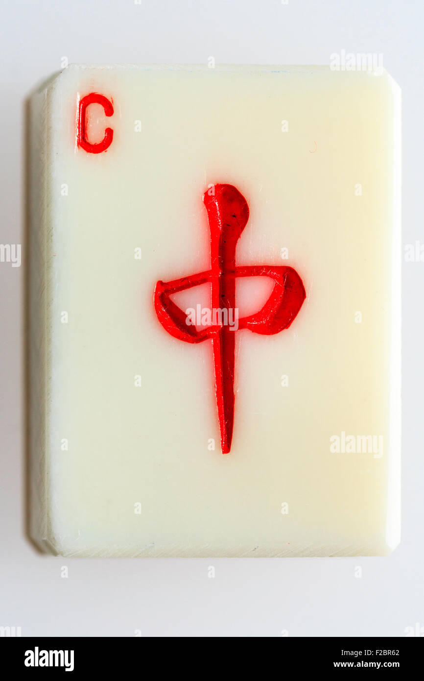 Close up of tile or card of a Mahjong set, red dragon Stock Photo - Alamy