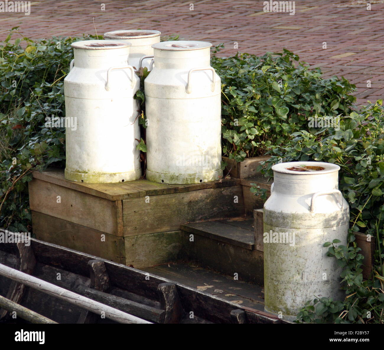 Milk cans ready for transport Stock Photo