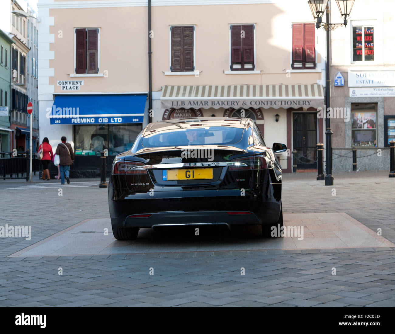 G1 registration plate Chief Minister official car Tesla Signature Model S , Gibraltar, British territory in southern Europe Stock Photo