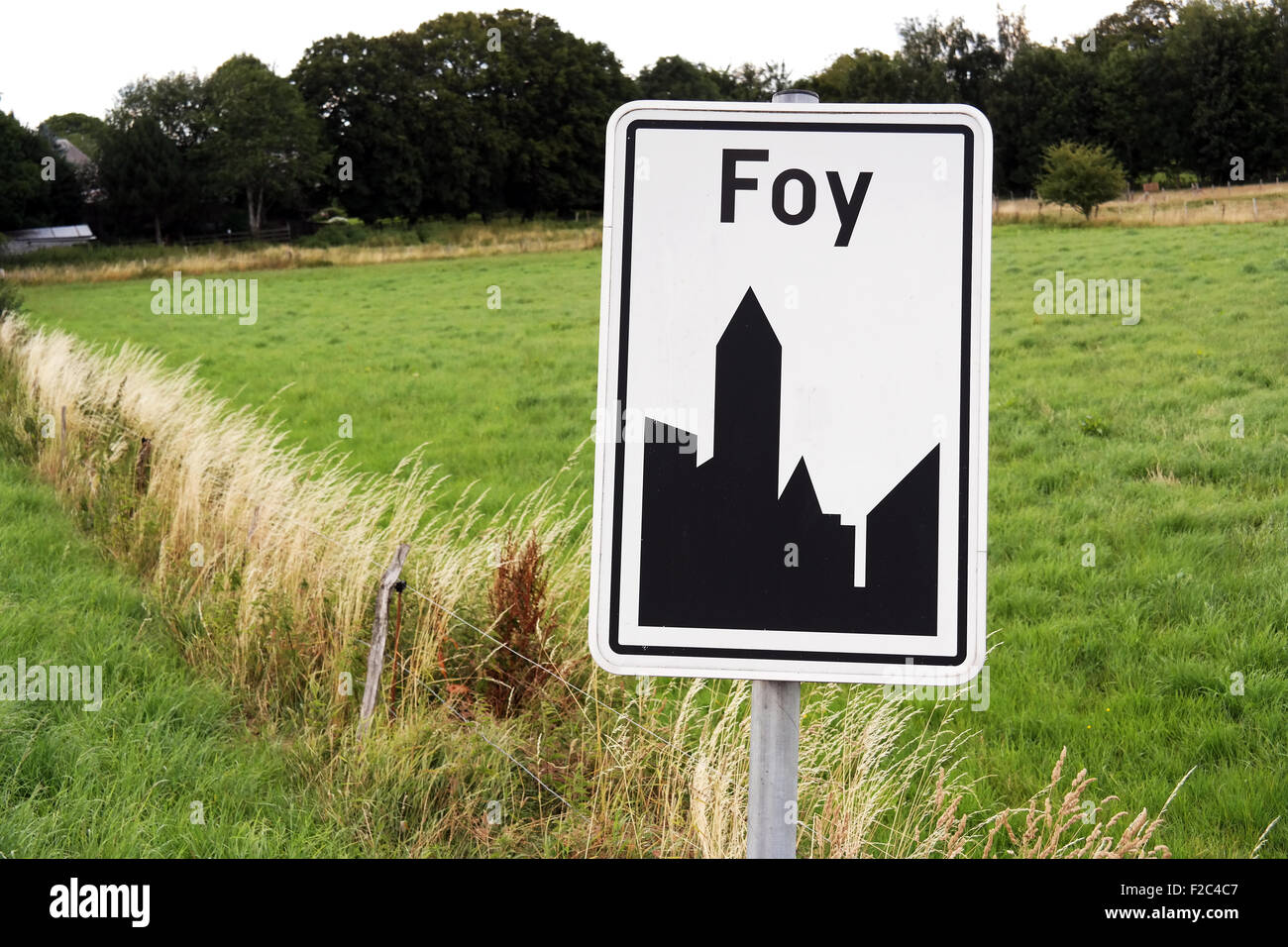 Road sign of Foy, a village near Bastogne in Belgium. Stock Photo