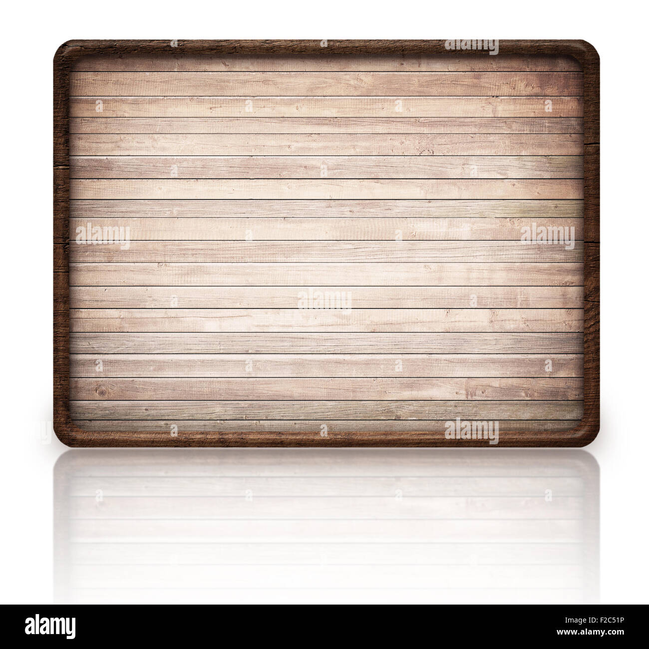 Brown wooden rectangle signboard and reflection on glass table, dark frame, light planks Stock Photo