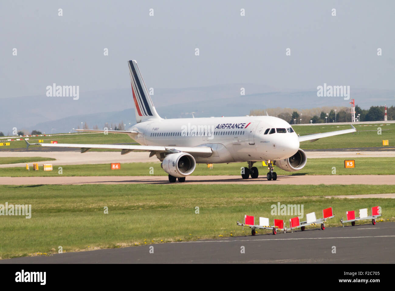 Air France Airbus A320 Passenger Plane Taxiing On Manchester Airport Air France Airbus A320 Passenger Plane Taxiing On Manchester Airport