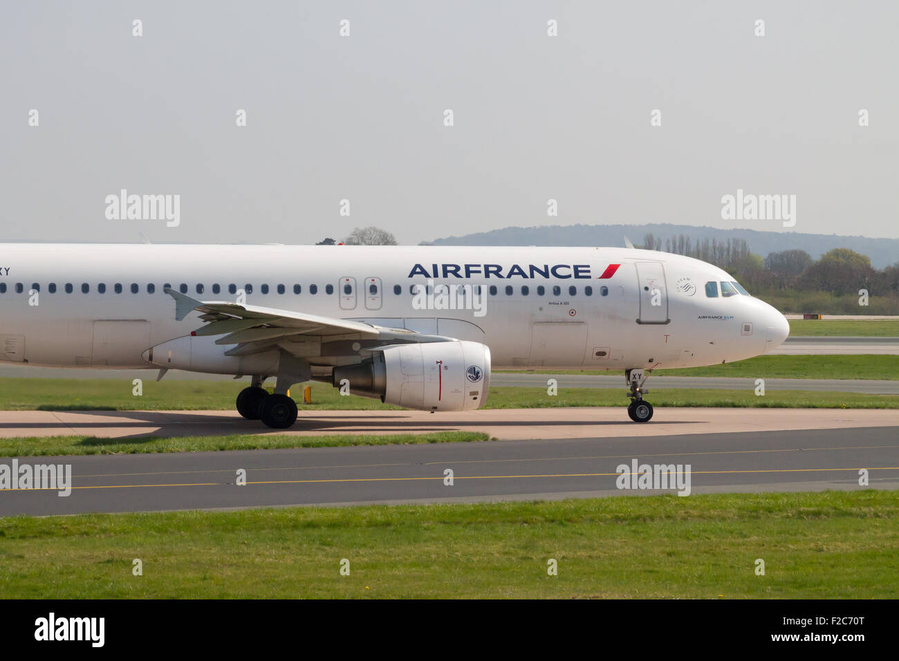 Air France Airbus A320 Passenger Plane Taxiing On Manchester Airport Air France Airbus A320 Passenger Plane Taxiing On Manchester Airport