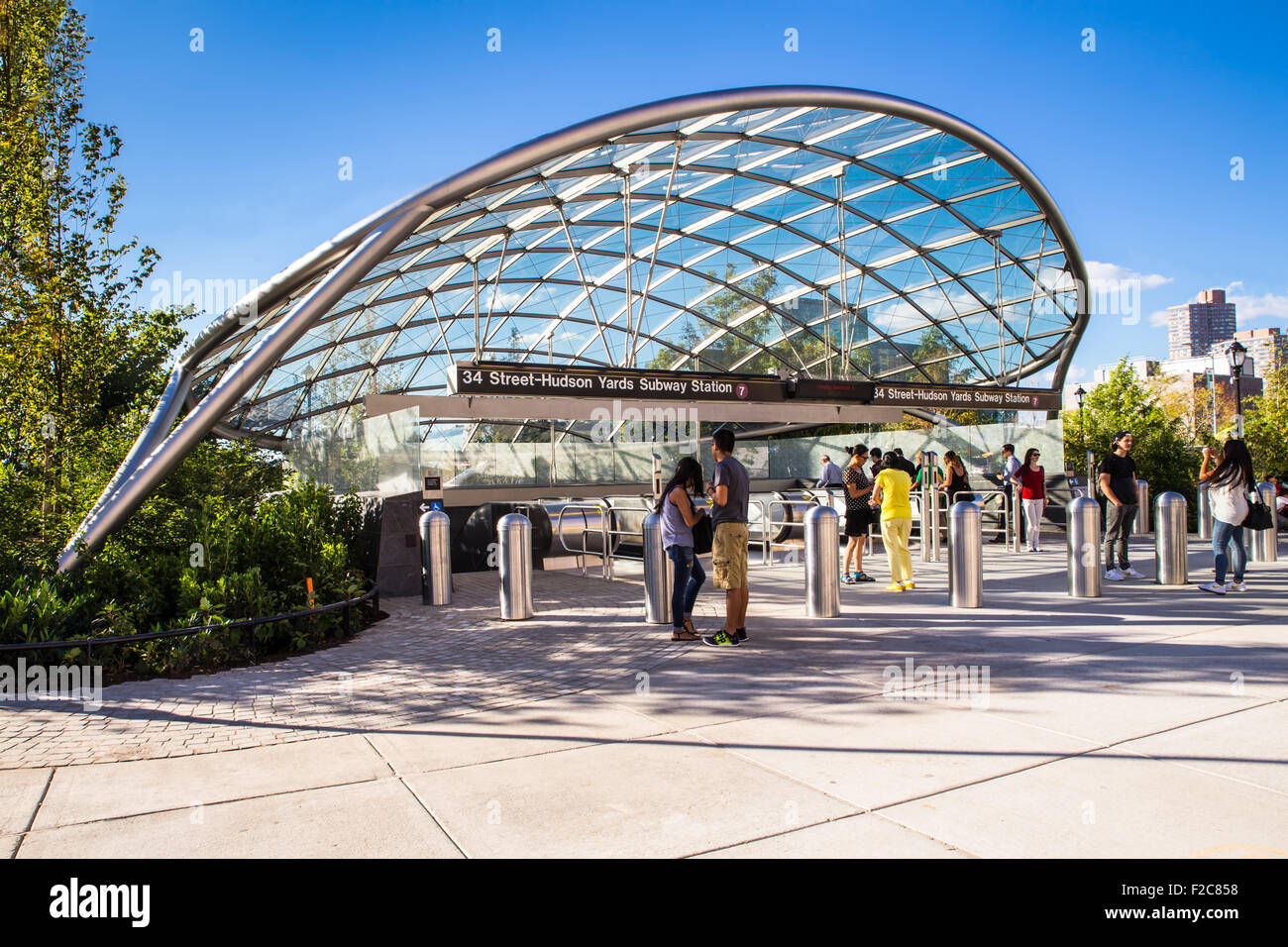 street view at new Hudson Yards 7 train subway station with travelers visible. Stock Photo