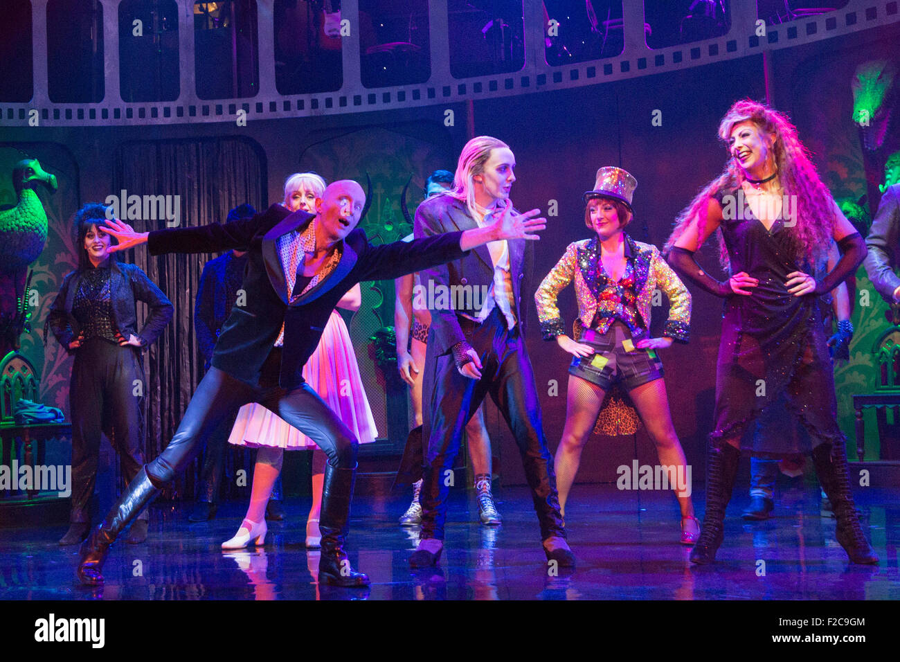 London, UK. 15 September 2015. Richard O'Brien, far left, joins the cast of his musical in the Time Warp dance on stage. The Rocky Horror Show, written and starring Richard O'Brien, returns to the West End for a limited run at the Playhouse theatre from 11 September 2015. The Rocky Horror Show Gala Performance on 17 September will be broadcast live to cinemas across the UK and Europe. With Richard O'Brien as Narrator, David Bedella as Frank'n'furter, Ben Forster as Brad, Haley Flaherty as Janet and Dominic Andersen as Rocky. Photo: Bettina Strenske Stock Photo