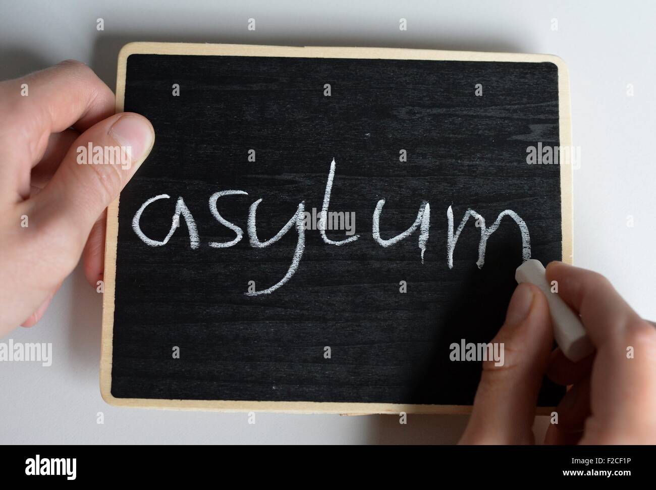 The word asylum is written on a board, Germany, city of Osterode, 15. September 2015. Photo: Frank May Stock Photo