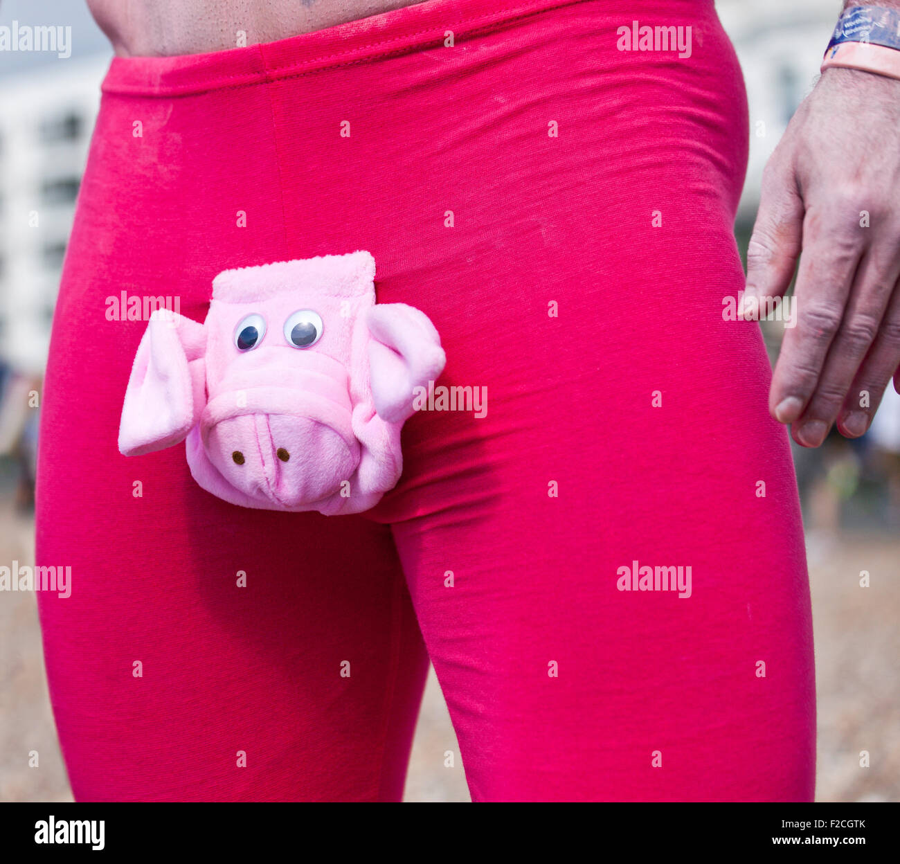 Man wearing a Pink Piggy posing pouch Stock Photo - Alamy