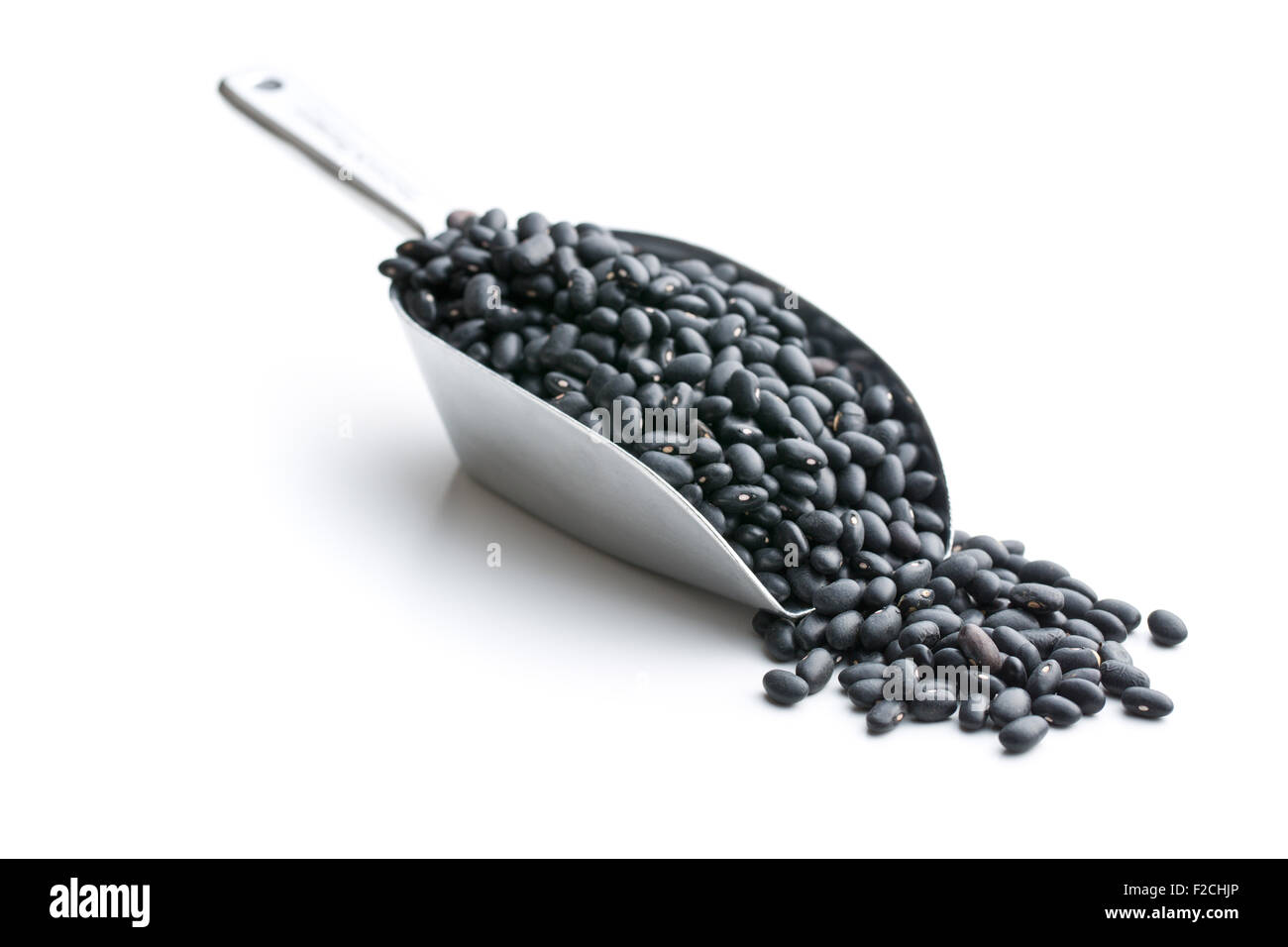 black beans in scoop on white background Stock Photo Alamy