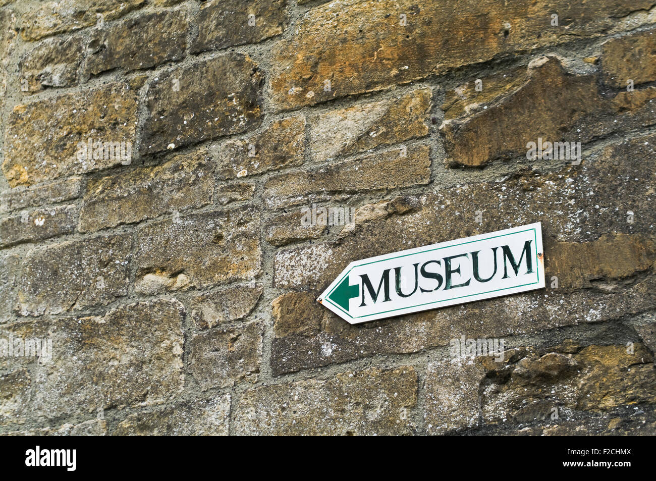 Sherborne Sign A sign with an arrow points to a museum in Sherborne, Dorset, England ...