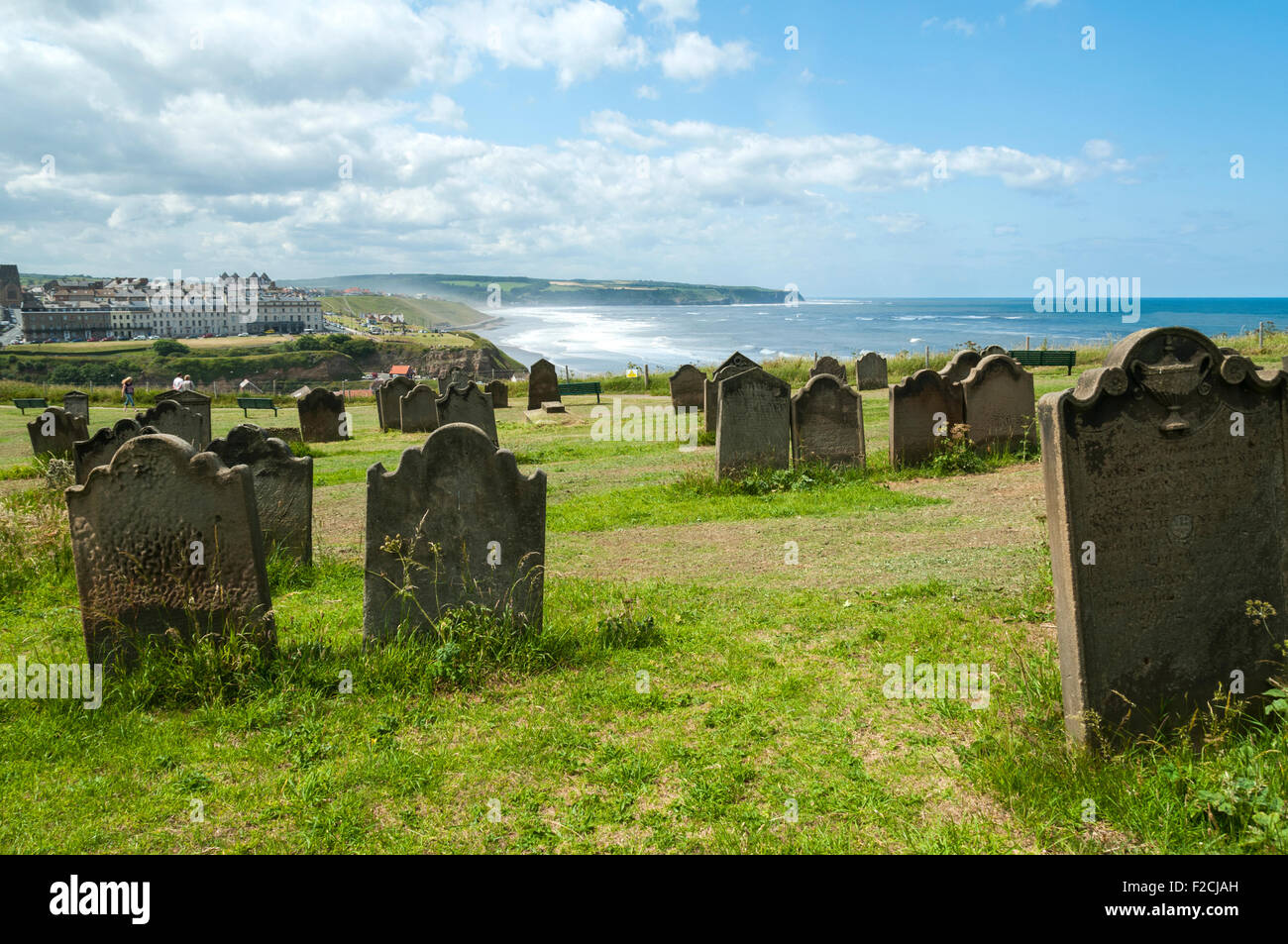 Graveyard of Saint Mary's church, looking towards Sandsend Bay.   East Cliff, Whitby, Yorkshire, England, UK Stock Photo