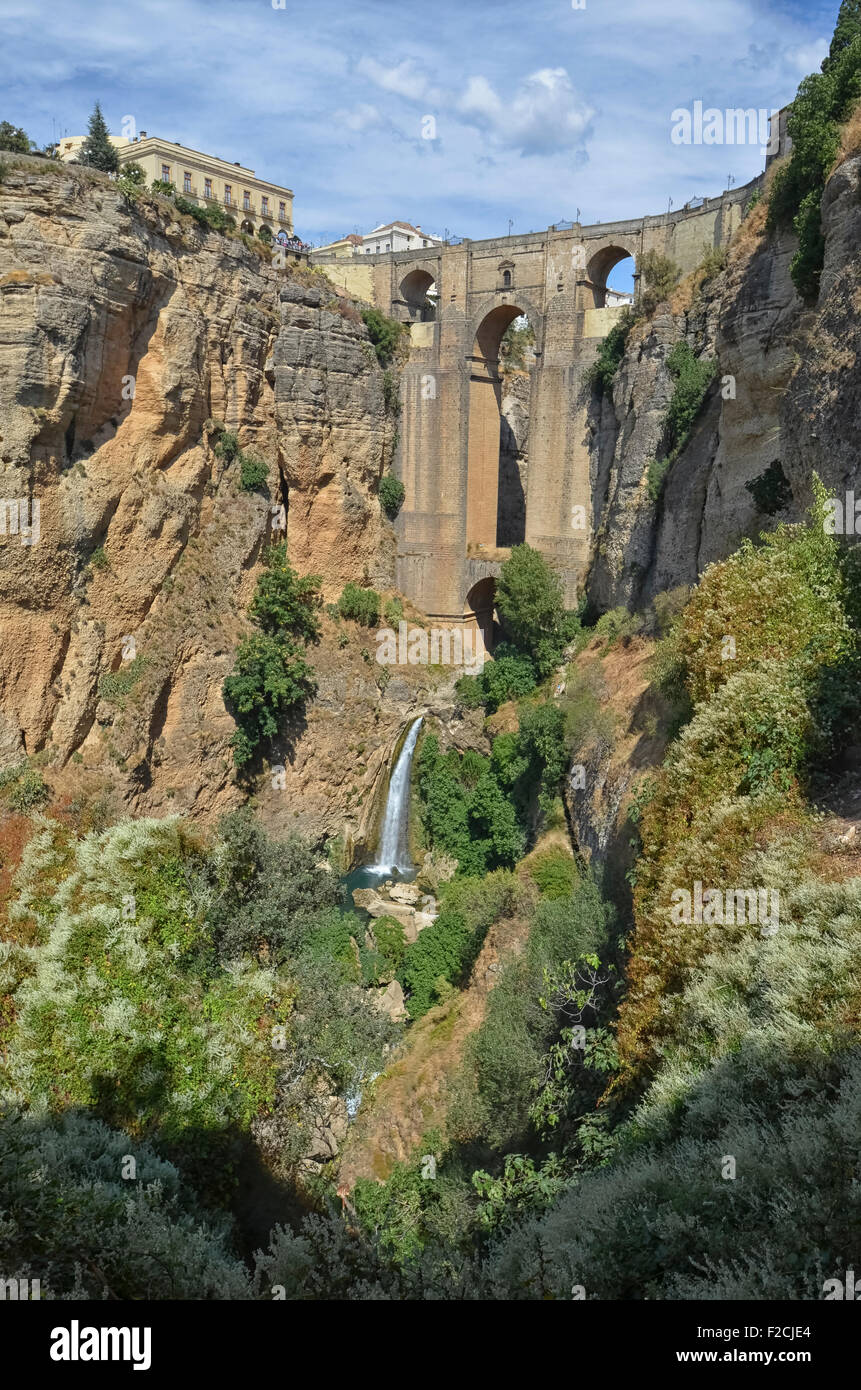 View of the bridge and the waterfall of Ronda Stock Photo