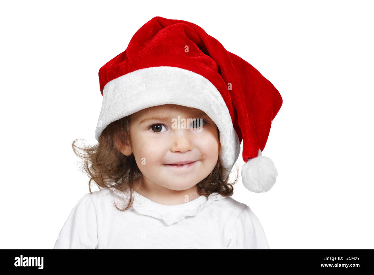 Funny child dressed santa hat, on white Stock Photo