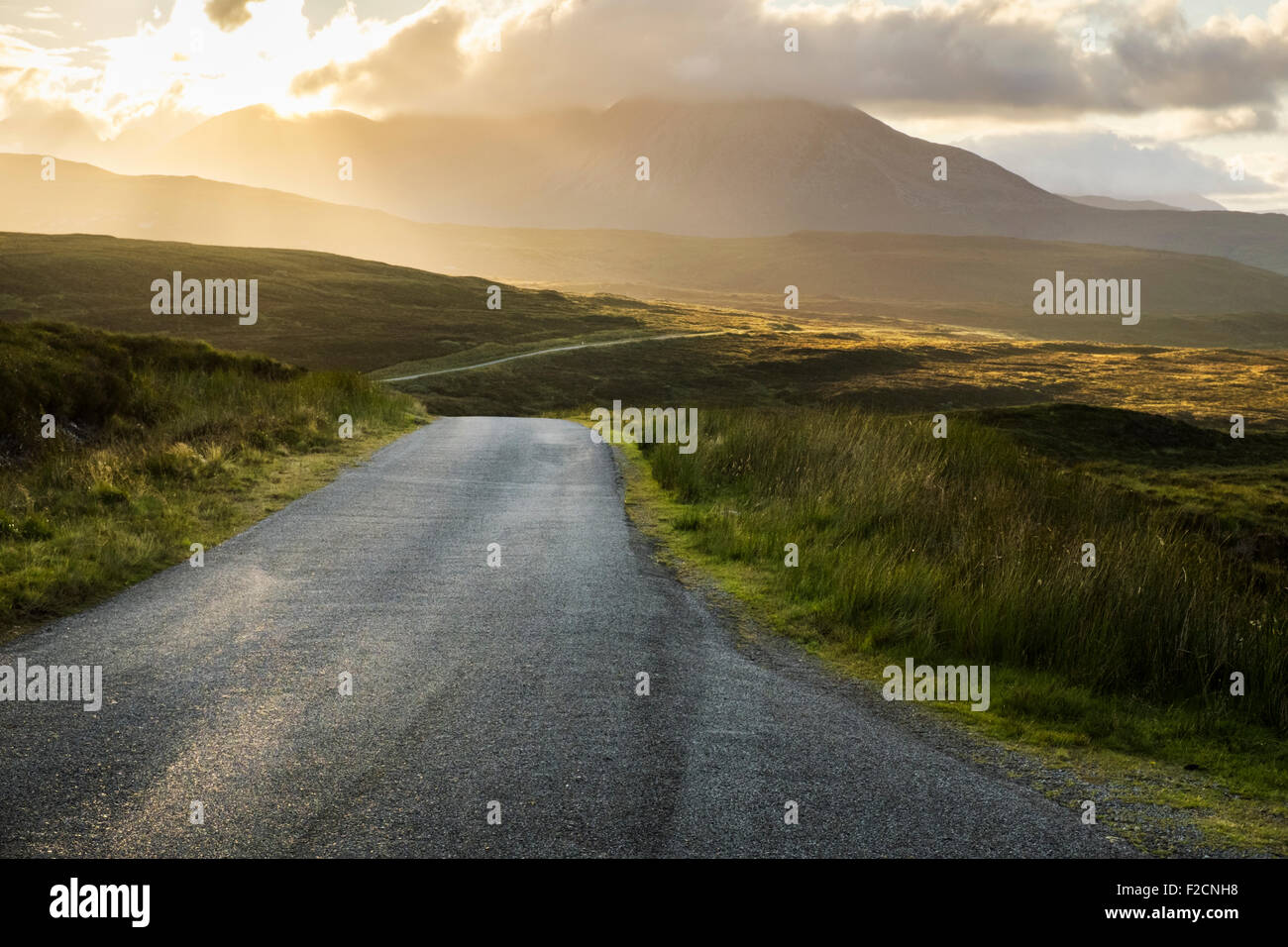 Mountain road winding through the Scottish Highlands. Stock Photo