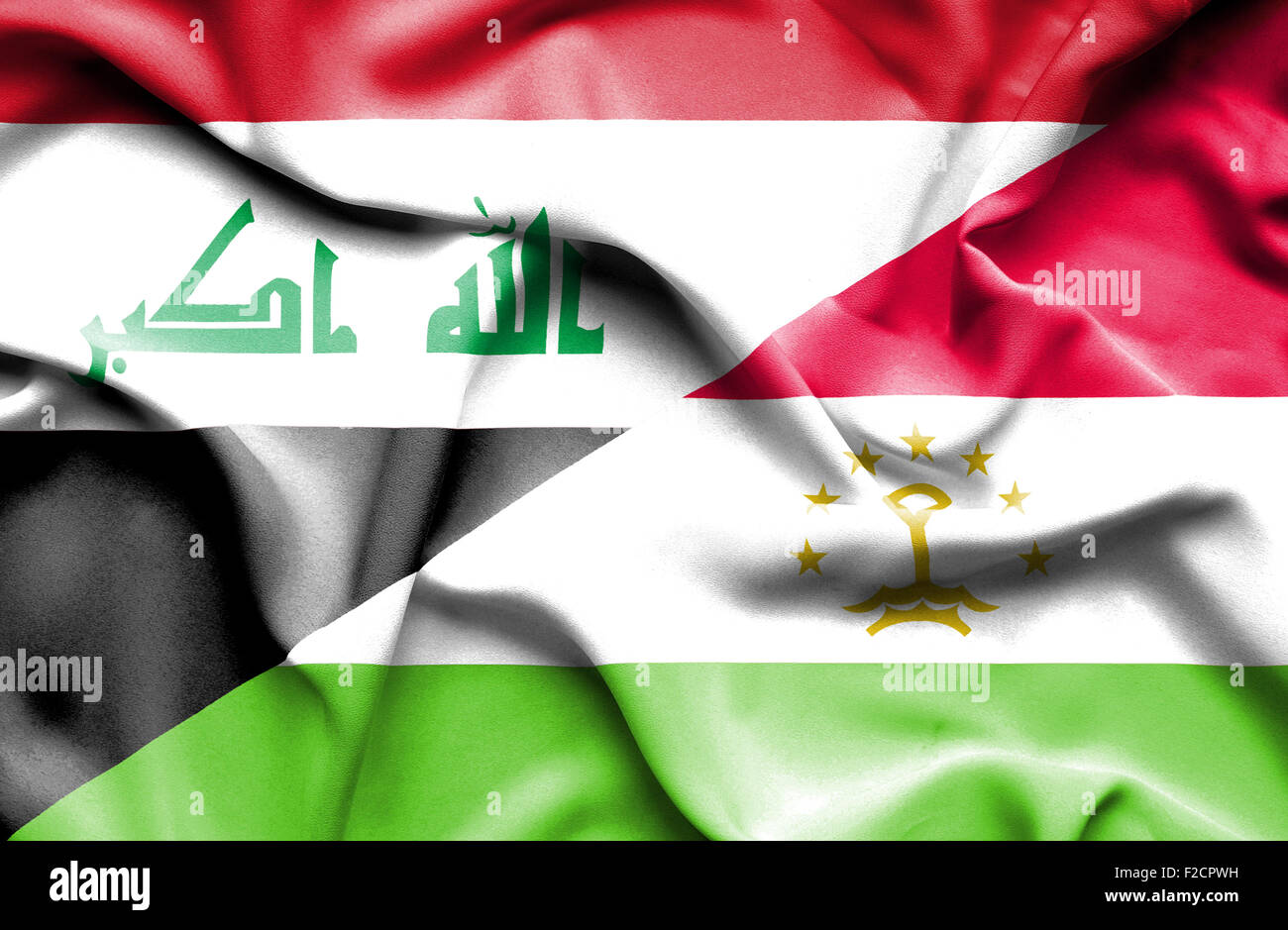 Waving flag of Tajikistan and Iraq Stock Photo