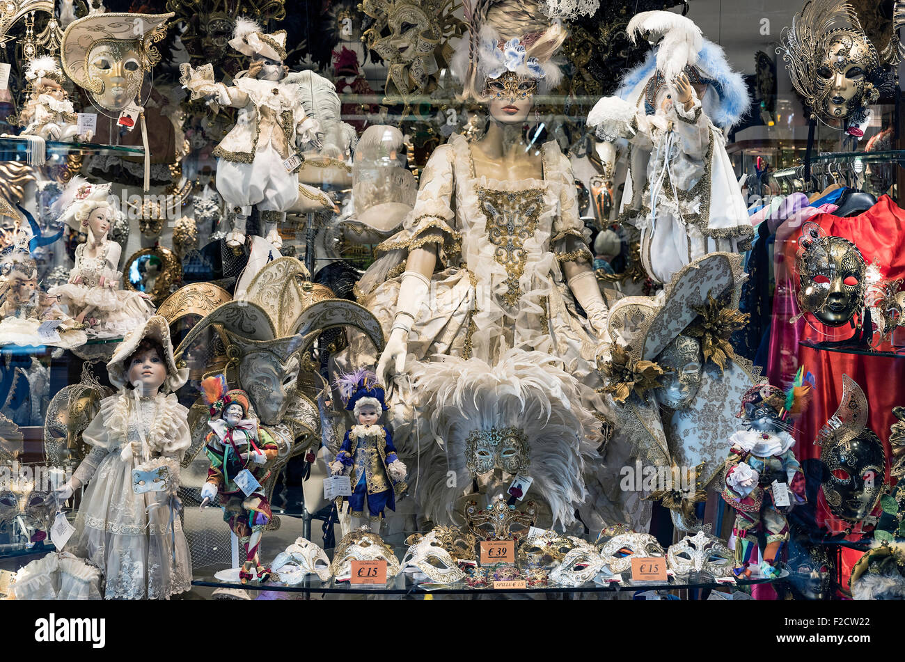Carnival related items in a shop window, Venice, Italy Stock Photo