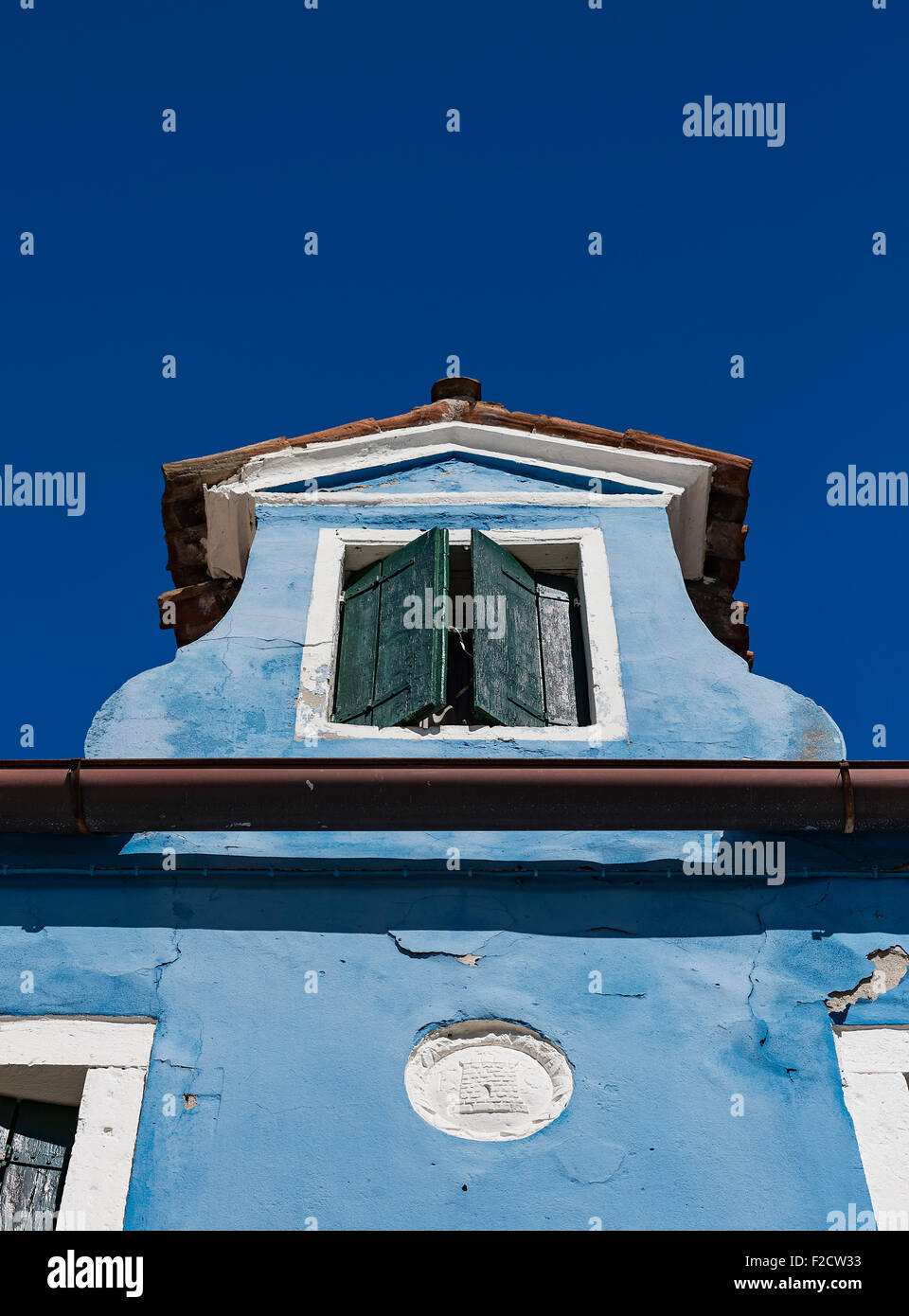 Colorful home facade in the Venetian fishing village island of Burano, Italy Stock Photo