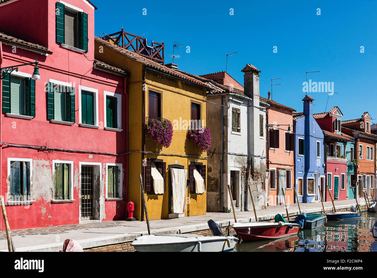 Colorful home facades in the Venetian fishing village island of Burano, Italy Stock Photo