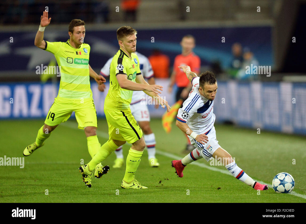 Ghelamco Arena, Gent, Belgium. 16th Sep, 2015. Champions League football.  KAA Gent versus Lyon. Mathieu Valbuena (ol) goes around the outside of  Brecht Dejaegere (gant) and Thomas Foket (gant) Credit: Action Plus