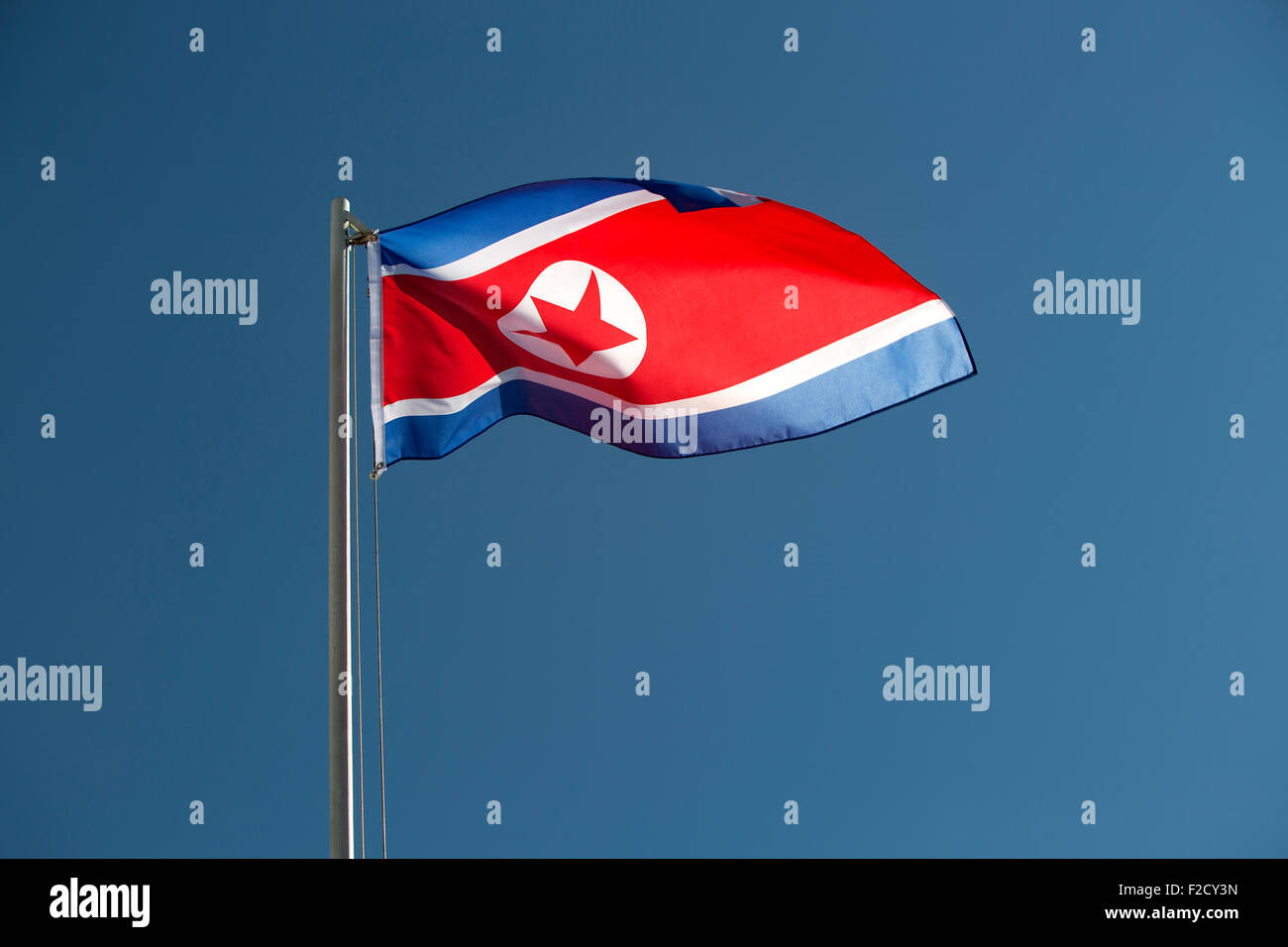 North Korea flag in front of a blue sky Stock Photo