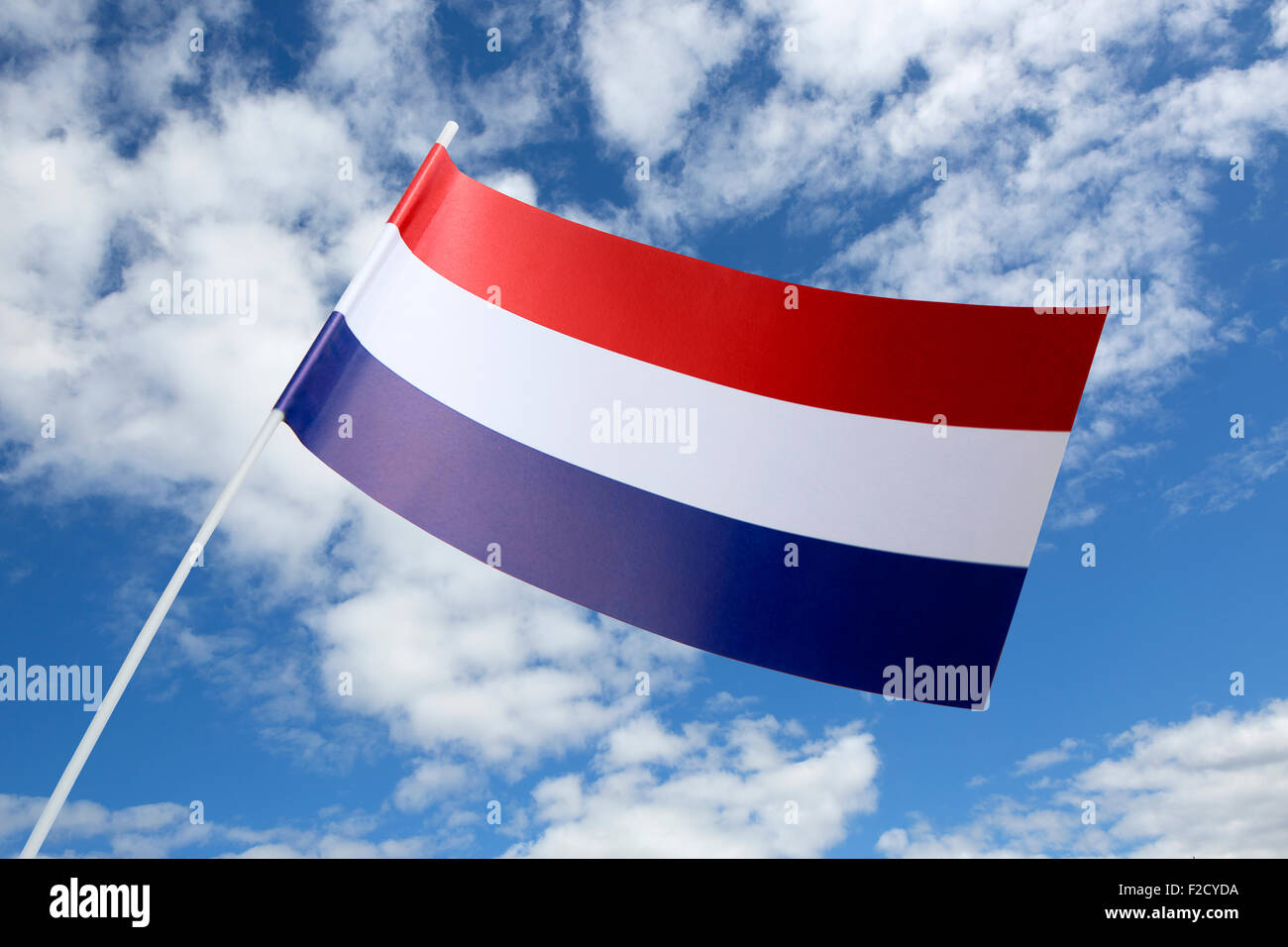Netherlands flag in front of a blue sky Stock Photo