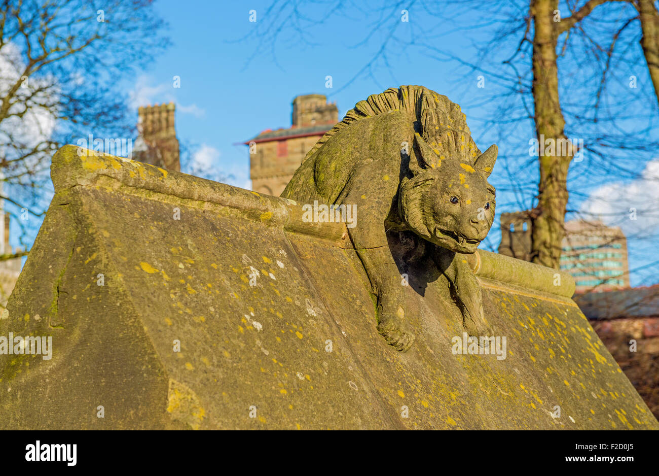 Hyena, carved in stone and placed on the wall adjoining Cardiff Castle, south Wales. Stock Photo