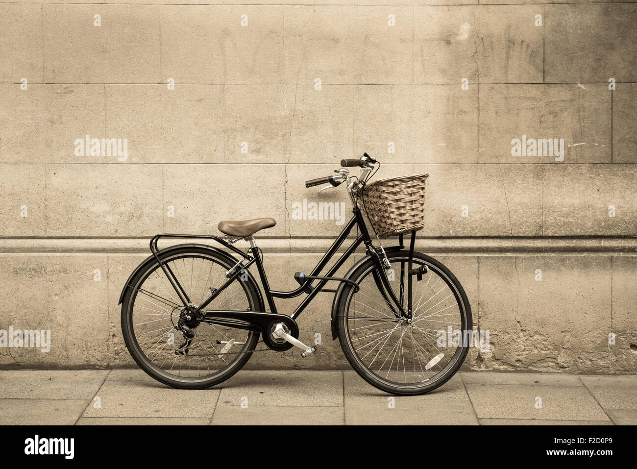 Vintage bicycle against a wall Stock Photo