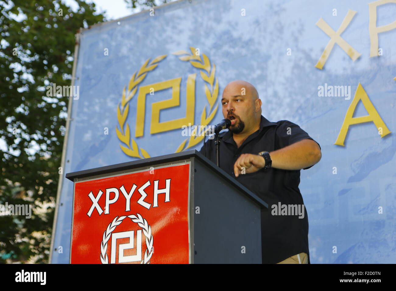 Athens, Greece. 16th September 2015. Golden Dawn MP (Member of Parliament) Ilias Panagiotaros addresses the election rally. Greek right wing  party Golden Dawn held an election rally in Athens, four days ahead of election day. The party hopes to gain enough seats in the election to become the third latest party in the Greek Parliament. Credit:  Michael Debets/Alamy Live News Stock Photo