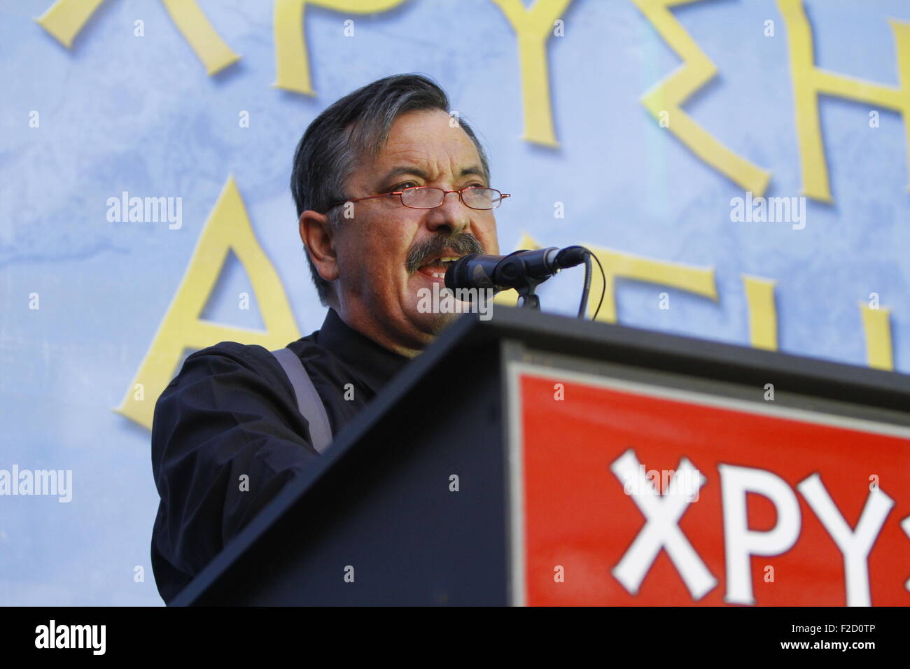 Athens, Greece. 16th September 2015. Golden Dawn MP (Member of Parliament) Christos Pappas addresses the election rally. Greek right wing  party Golden Dawn held an election rally in Athens, four days ahead of election day. The party hopes to gain enough seats in the election to become the third latest party in the Greek Parliament. Credit:  Michael Debets/Alamy Live News Stock Photo