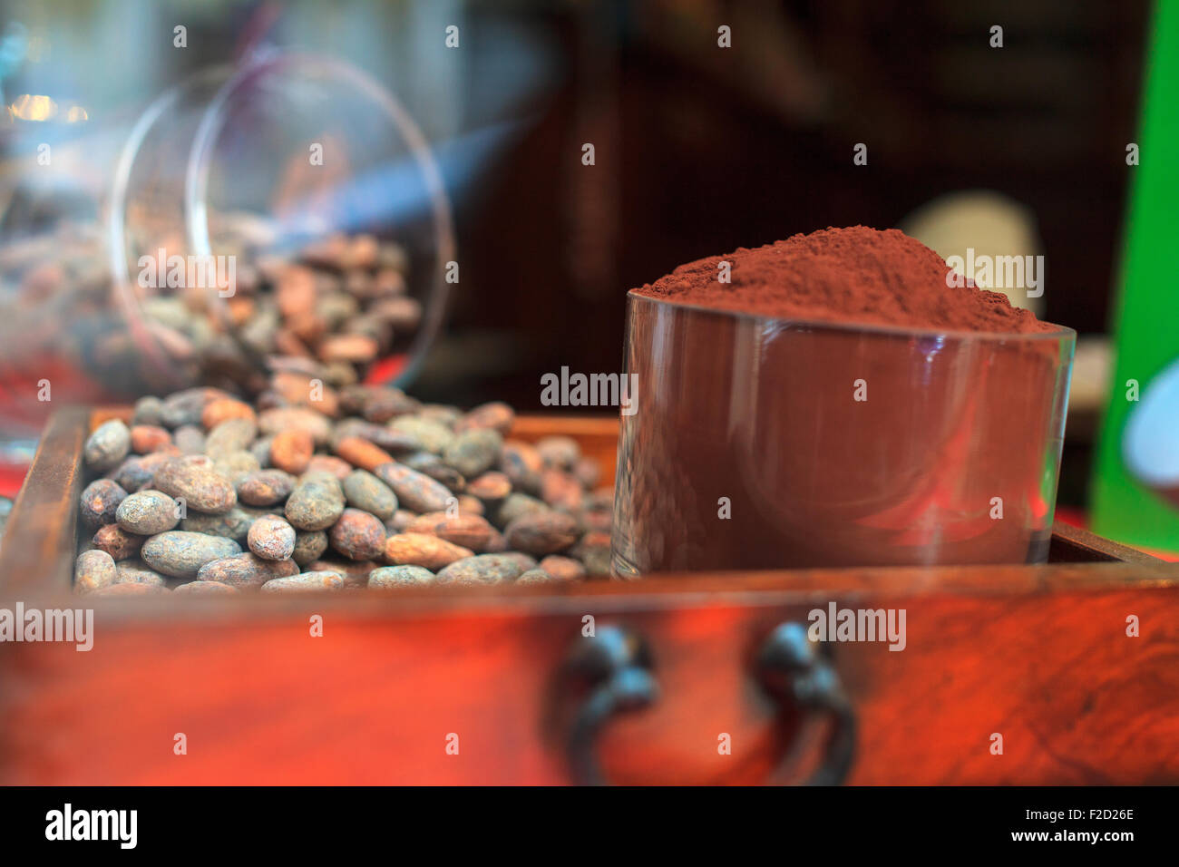 View of chocolate beans and cacao in the drawer of a cabinet Stock Photo