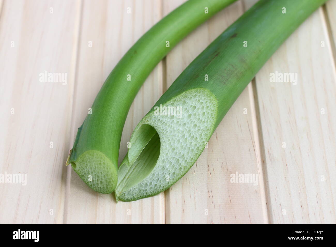 Close up of Taro stem on wooden board Stock Photo