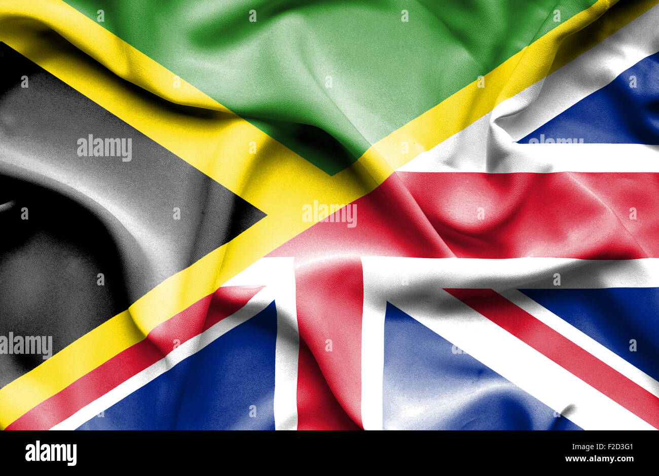Waving flag of United Kingdom and Jamaica Stock Photo - Alamy