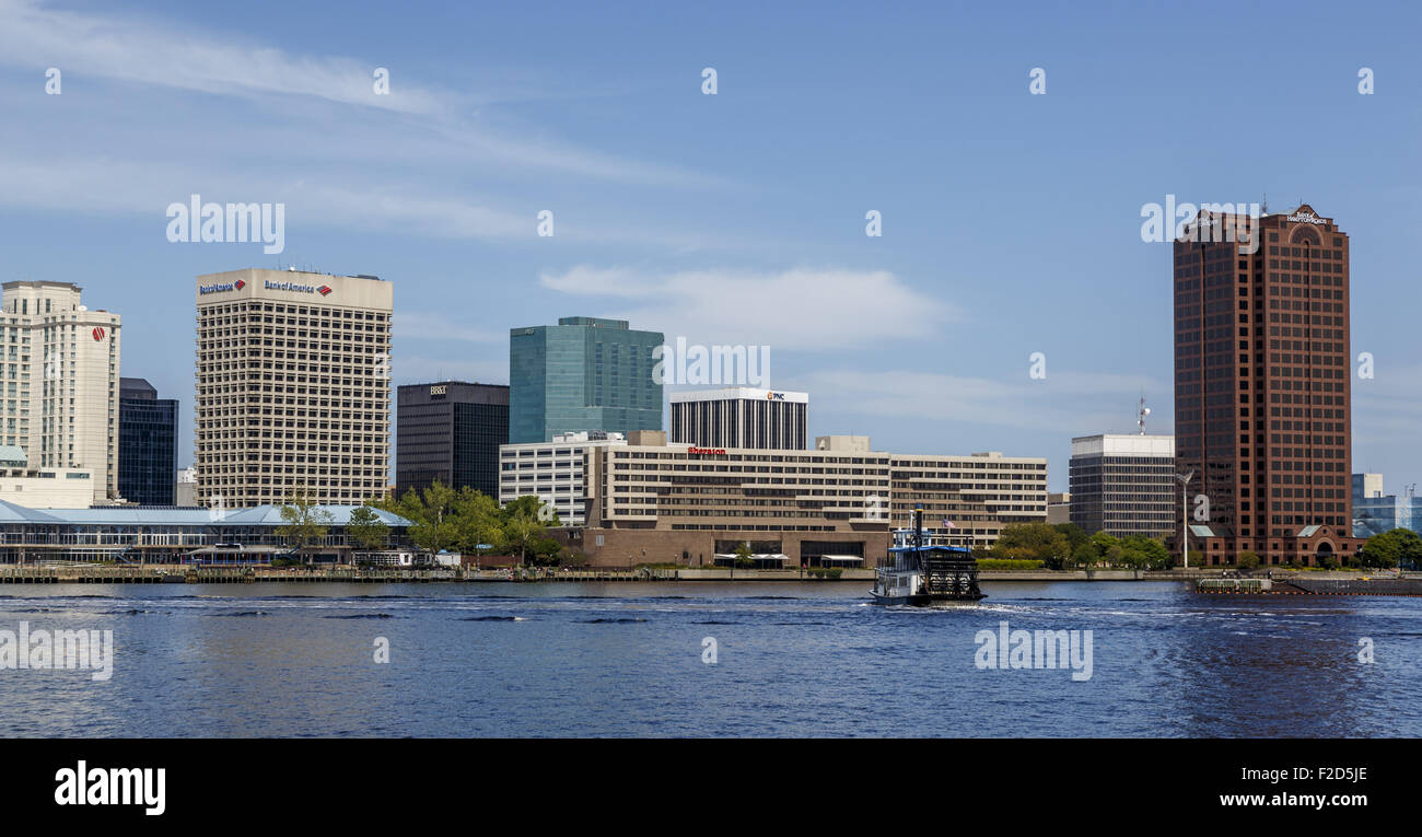Paddle wheel ferry approaching Norfolk city waterfront seen from water aspect Virginia Stock Photo
