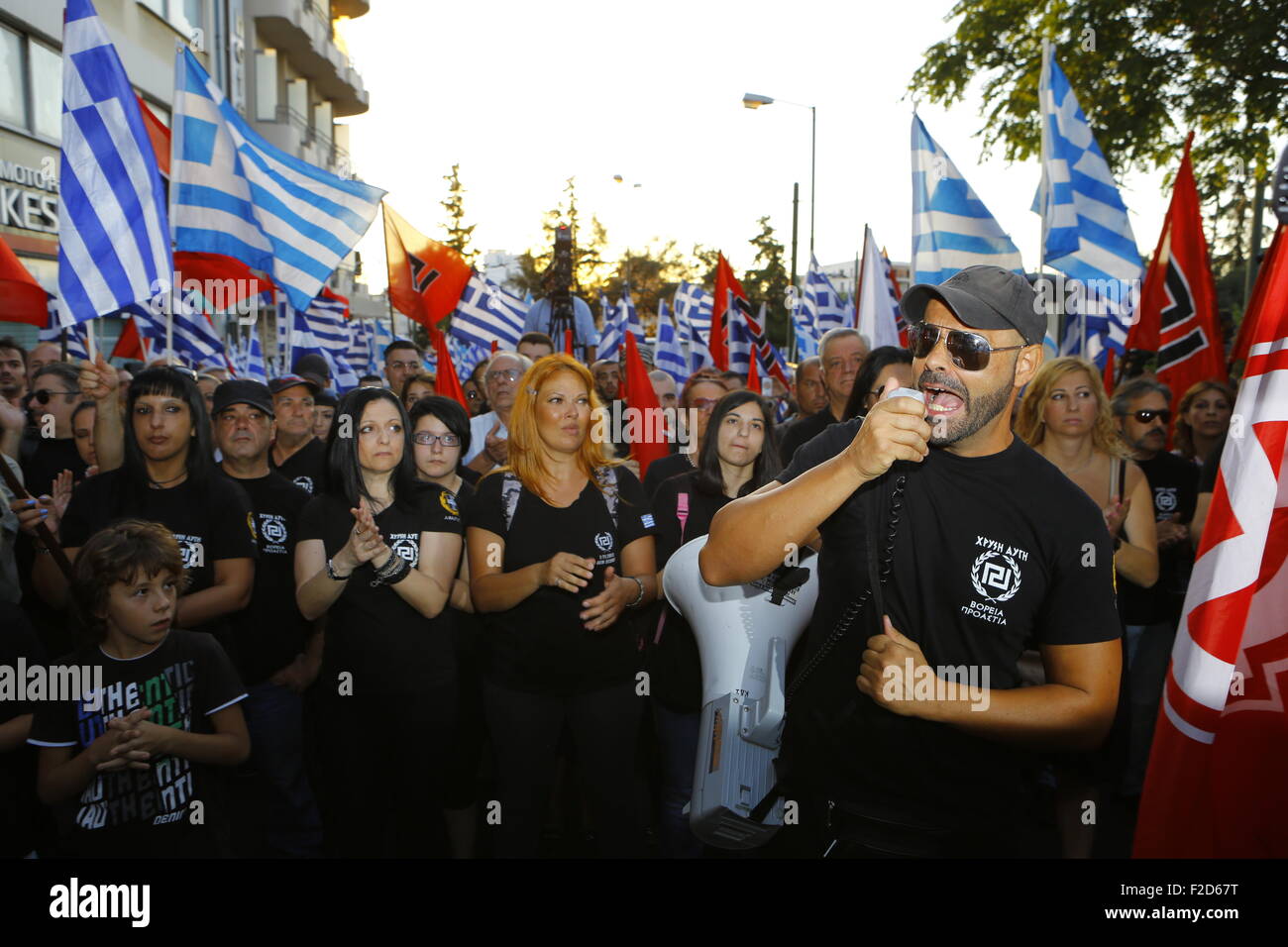 Athens, Greece. 16th Sep, 2015. A man shouts slogans to the crowd through a megaphone at the Golden Dawn election rally. Greek right wing party Golden Dawn held an election rally in Athens, four days ahead of election day. The party hopes to gain enough seats in the election to become the third latest party in the Greek Parliament. Credit:  Michael Debets/Pacific Press/Alamy Live News Stock Photo