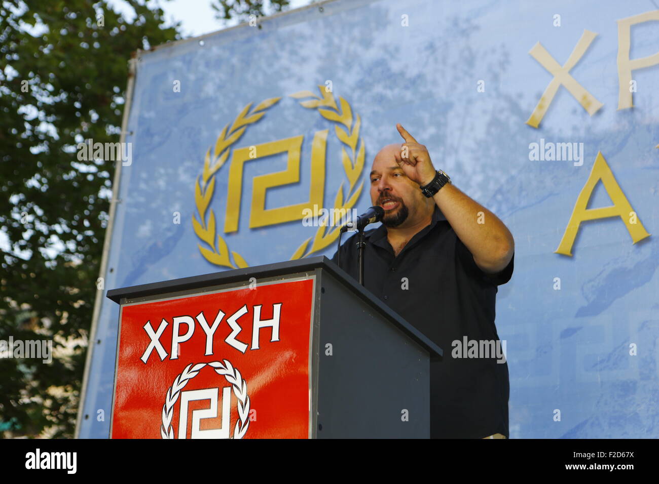 Athens, Greece. 16th Sep, 2015. Golden Dawn MP (Member of Parliament) Ilias Panagiotaros addresses the election rally. Greek right wing party Golden Dawn held an election rally in Athens, four days ahead of election day. The party hopes to gain enough seats in the election to become the third latest party in the Greek Parliament. Credit:  Michael Debets/Pacific Press/Alamy Live News Stock Photo