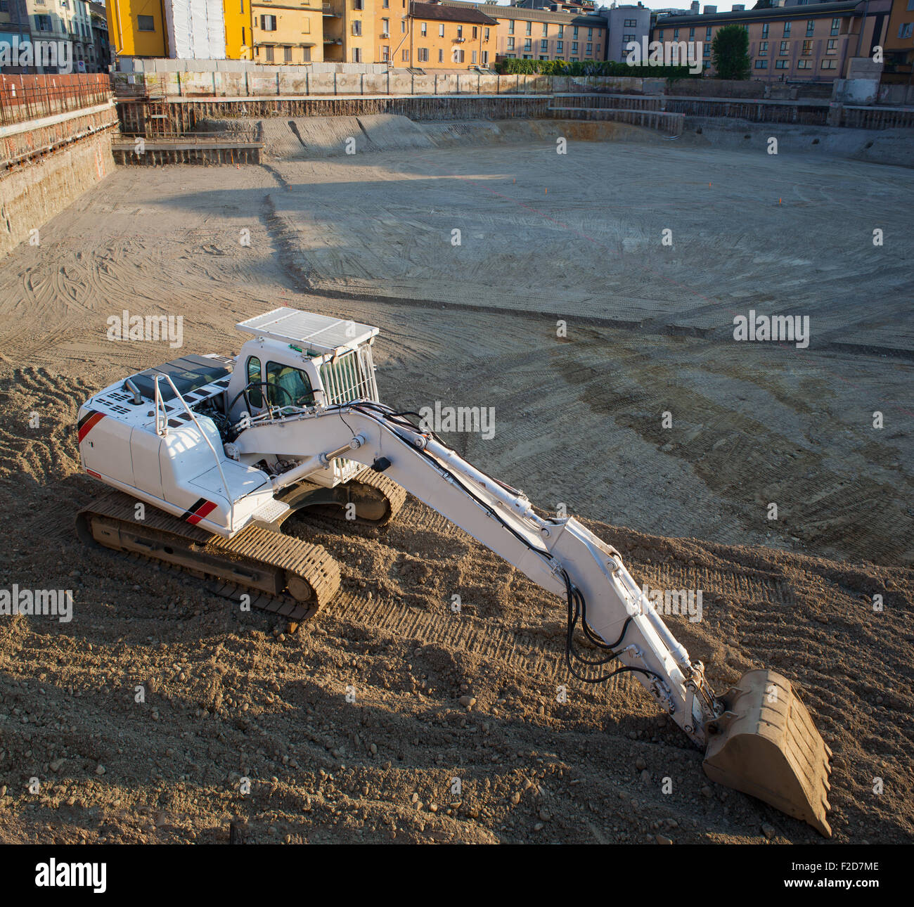 View of white excavator on the construction site Stock Photo