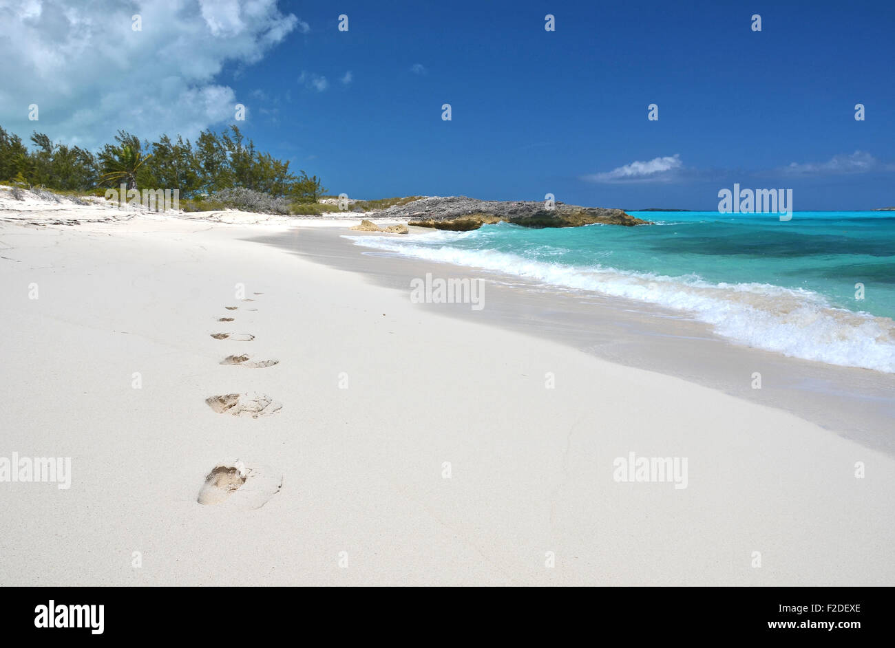 Footprints on the desrt beach of Little Exuma, Bahamas Stock Photo