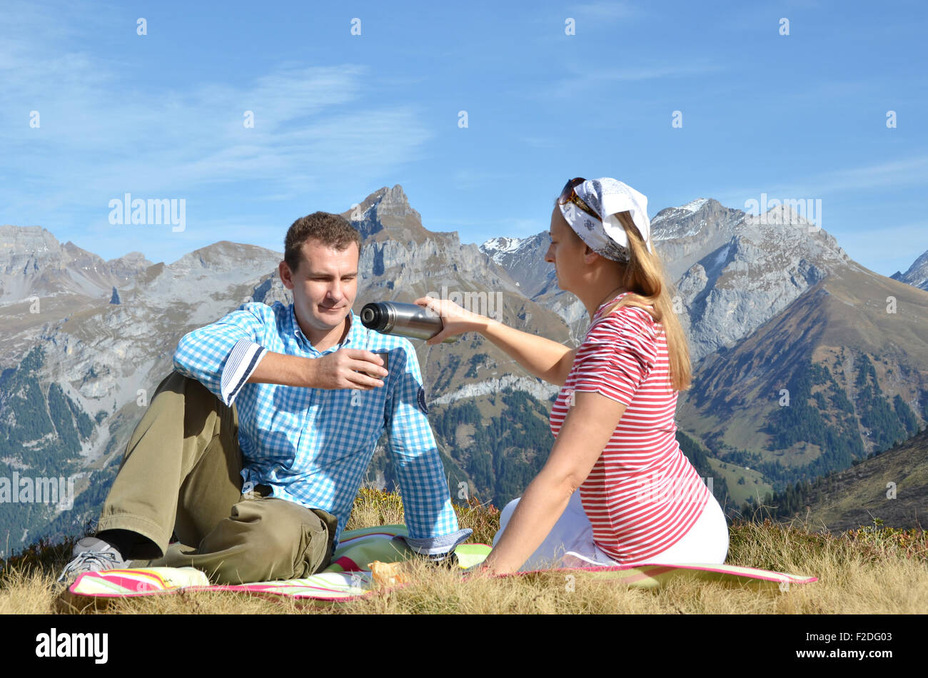 Picnic in Alpine meadow. Switzerland Stock Photo