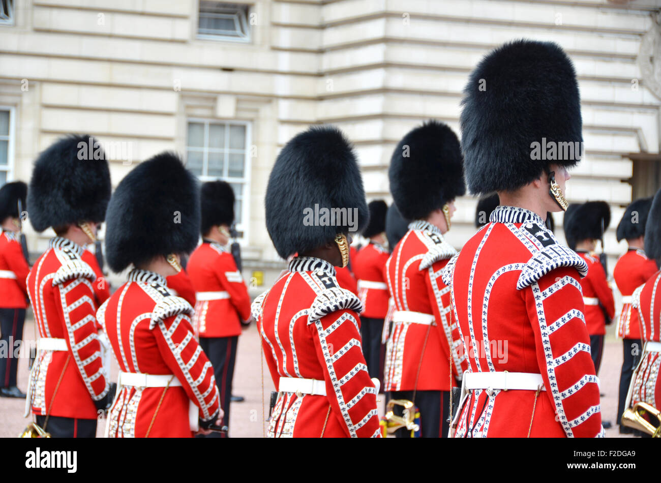 LONDON, UK – JUNE 12, 2014: British Royal guards perform the Changing of the Guard in Buckingham Palace Stock Photo