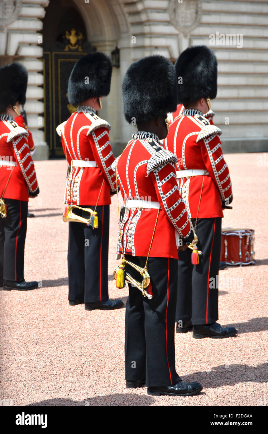 LONDON, UK a?? JUNE 12, 2014: British Royal guards perform the Changing of the Guard in Buckingham Palace Stock Photo