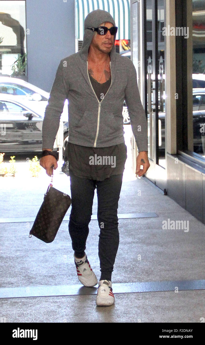 Mickey Rourke goes to Cafe Rome in Beverly Hills in a grey hoodie and ...