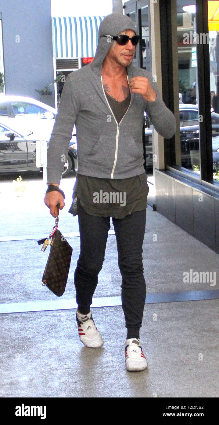 Mickey Rourke goes to Cafe Rome in Beverly Hills in a grey hoodie and ...