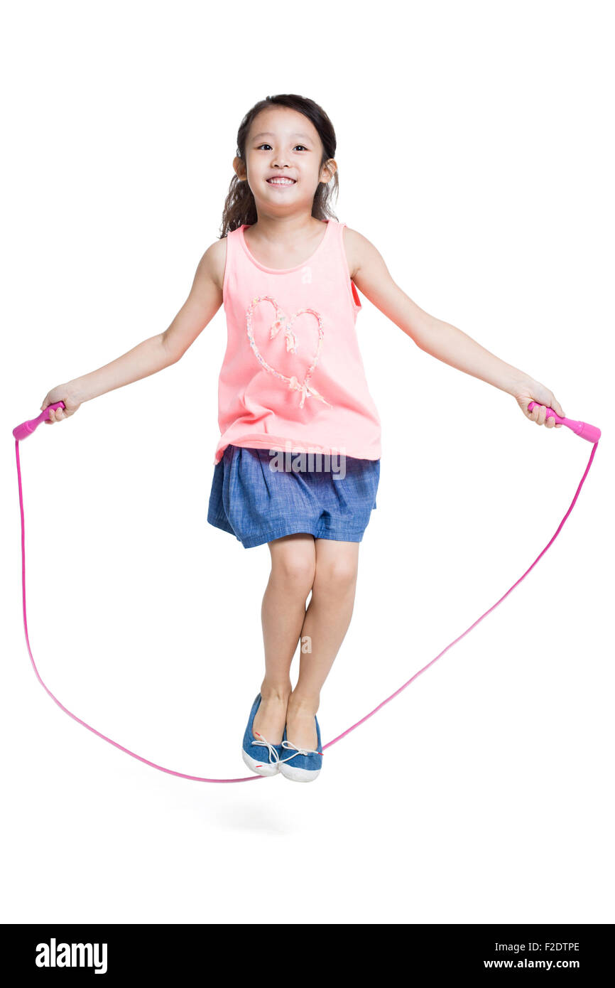 Happy girl jumping rope Stock Photo Alamy