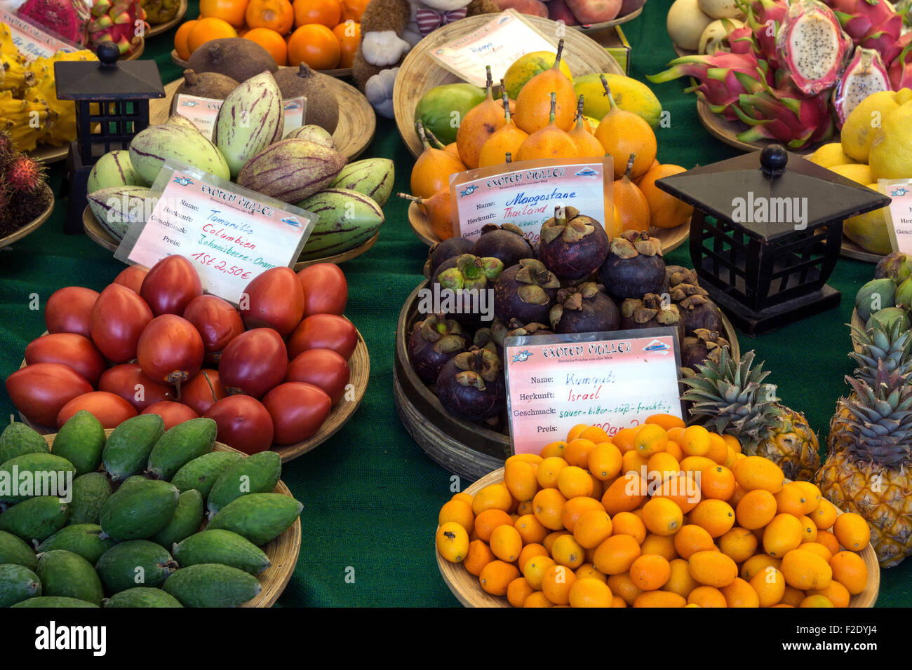 Various exotic fruits at a fruit stand, Viktualienmarkt, Munich, Bavaria, Germany Stock Photo