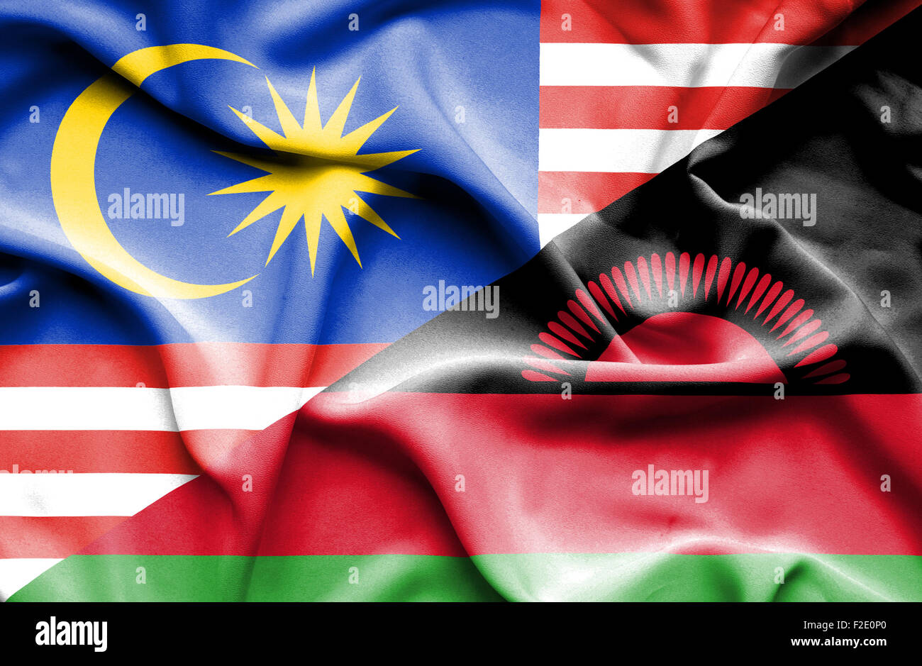 Waving flag of Malawi and Malaysia Stock Photo Alamy