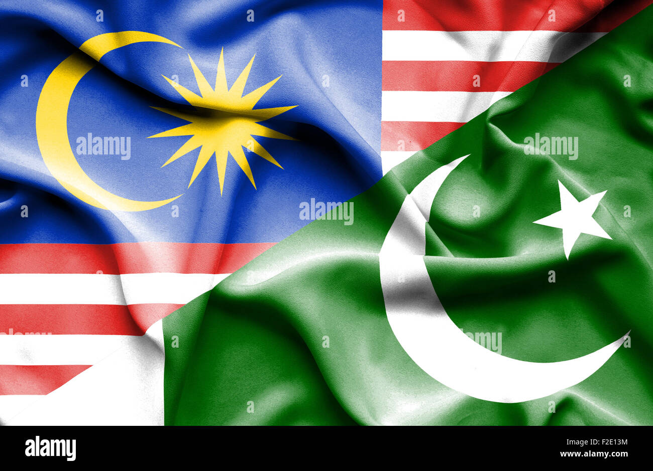 Waving flag of Pakistan and Malaysia Stock Photo - Alamy