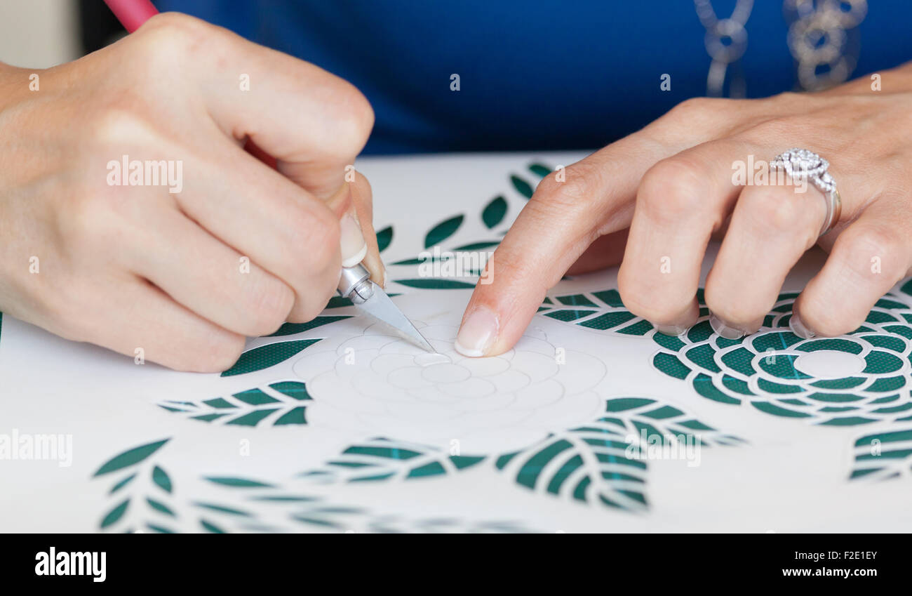 Creations of paper cut made by the skill of the craftsman. Stock Photo