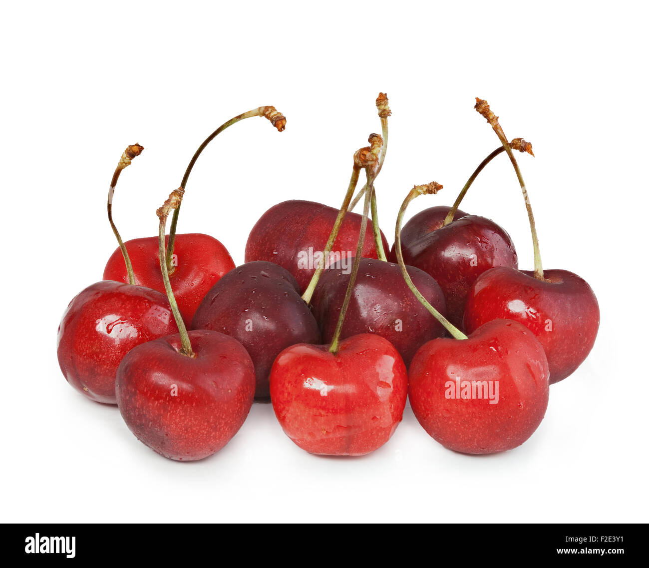 Handful of fresh cherries on white background Stock Photo - Alamy