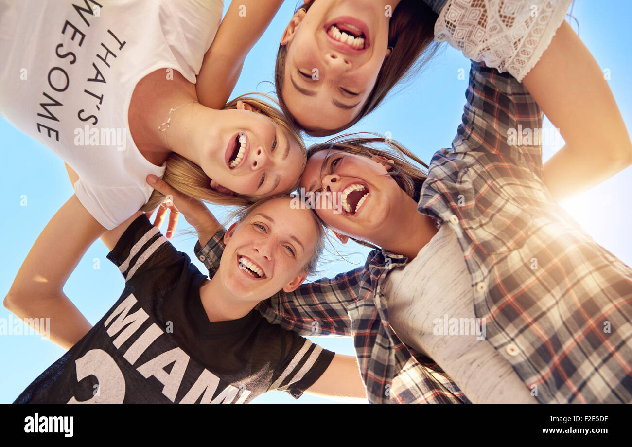 Group of teenagers staying together looking at camera Stock Photo