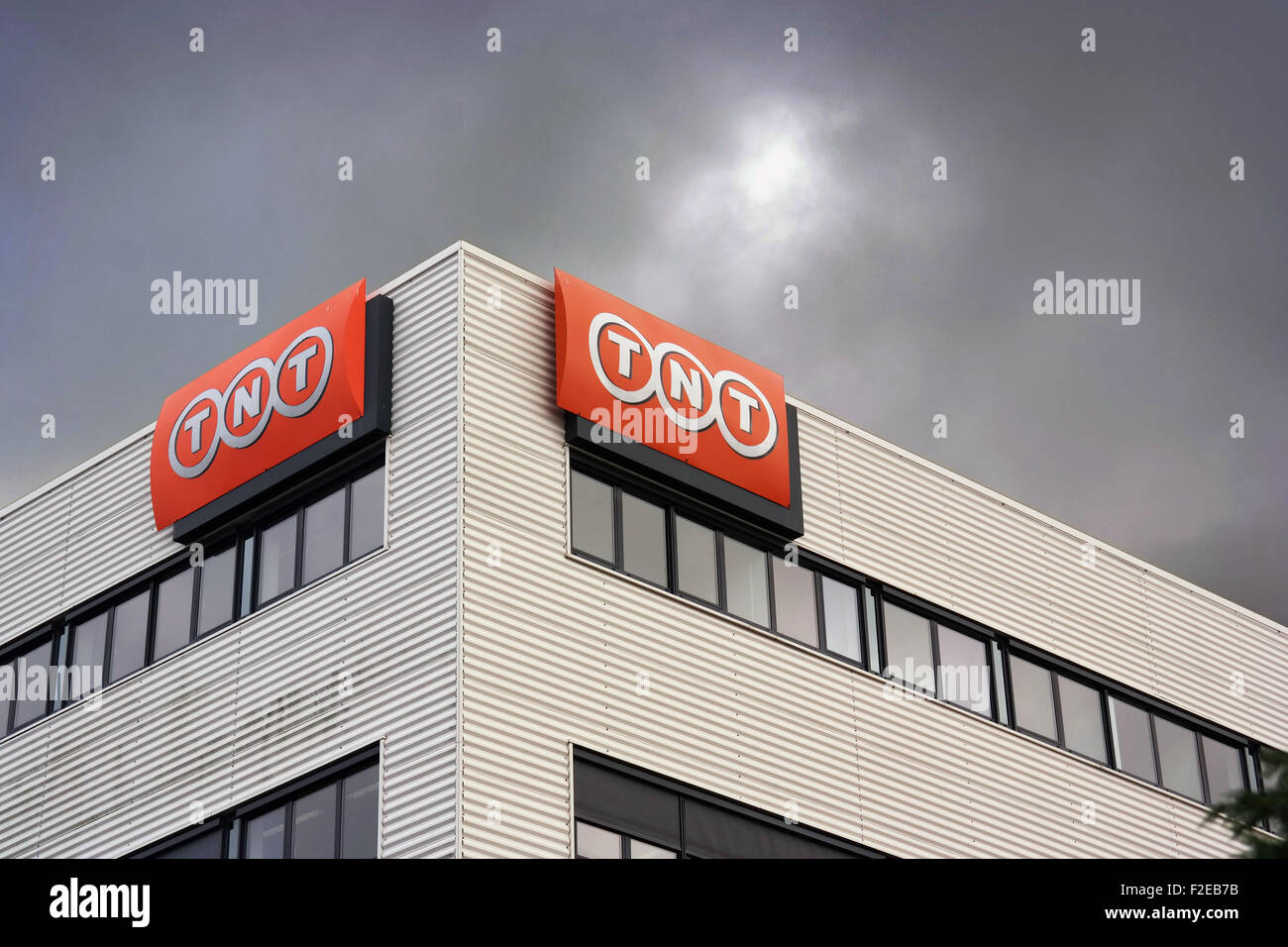 TNT logo on building in Nieuwegein, Netherlands. TNT Express N.V. is an international courier delivery services company. Stock Photo